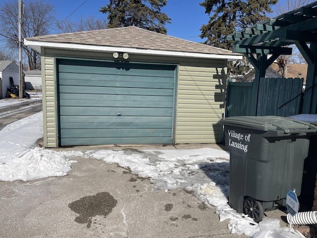 detached garage with fence