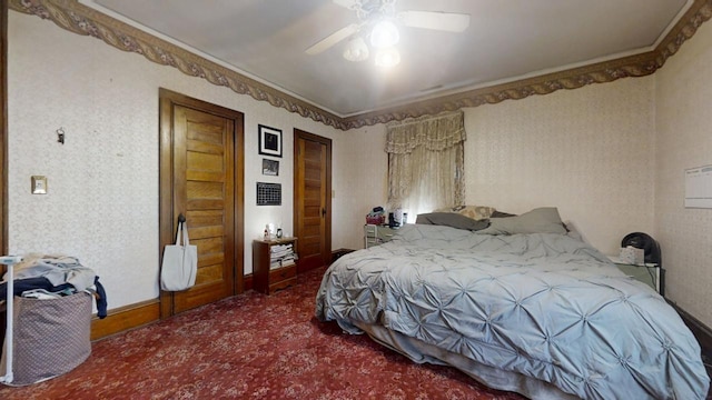 bedroom featuring ornamental molding, carpet flooring, ceiling fan, and baseboards