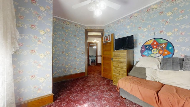 bedroom featuring carpet floors, wallpapered walls, baseboards, and crown molding