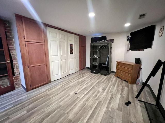 bedroom with recessed lighting, visible vents, baseboards, a closet, and light wood-type flooring