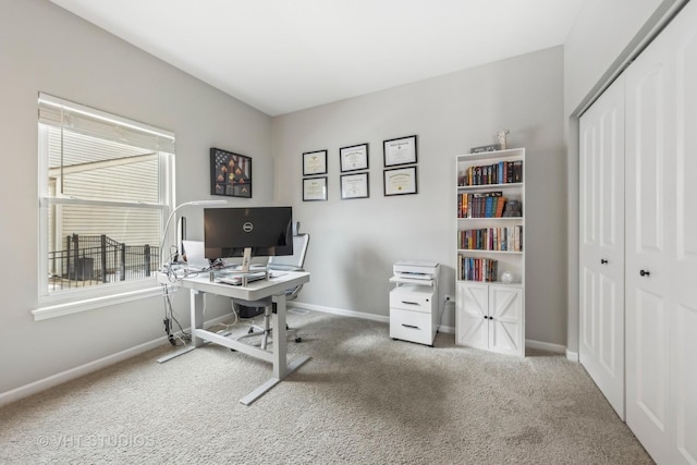 office featuring carpet floors and baseboards