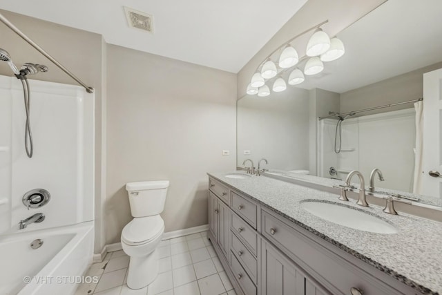 full bathroom featuring double vanity, a sink, visible vents, and baseboards