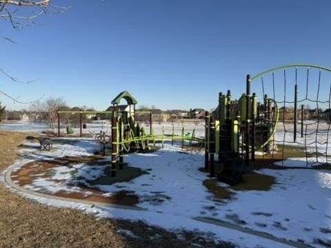 snow covered playground with playground community