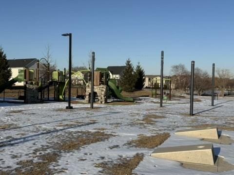 snow covered playground with playground community