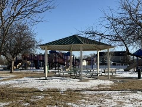 view of home's community featuring playground community