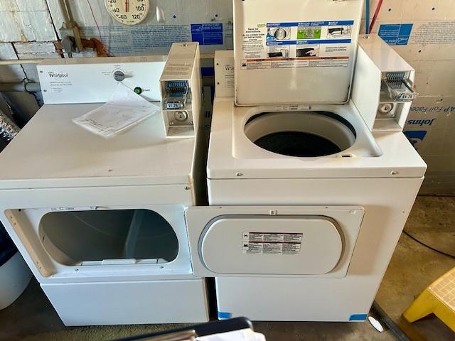 laundry room with washer and dryer