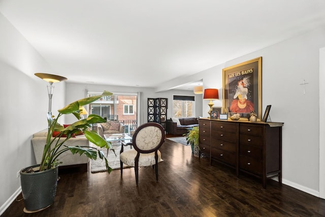 sitting room featuring dark wood-style floors and baseboards