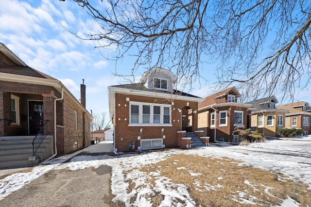 view of front facade featuring brick siding