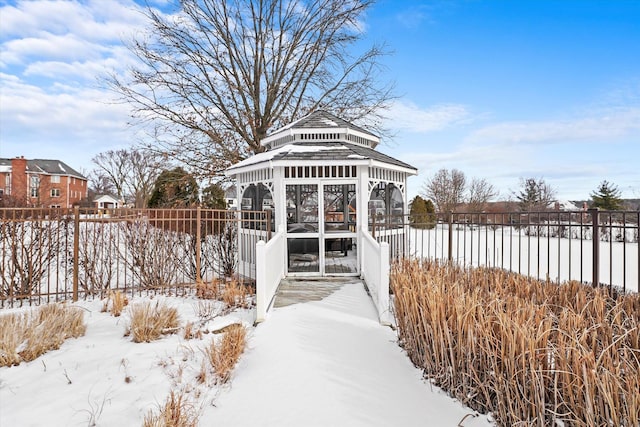 view of property's community with fence