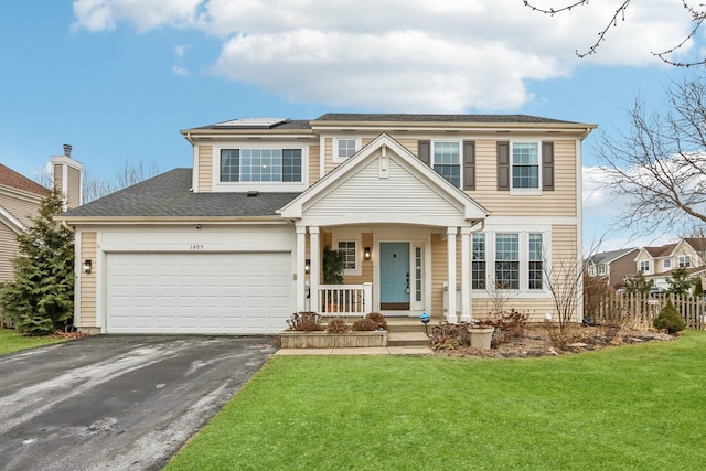 view of front of property with a garage, aphalt driveway, covered porch, fence, and a front lawn