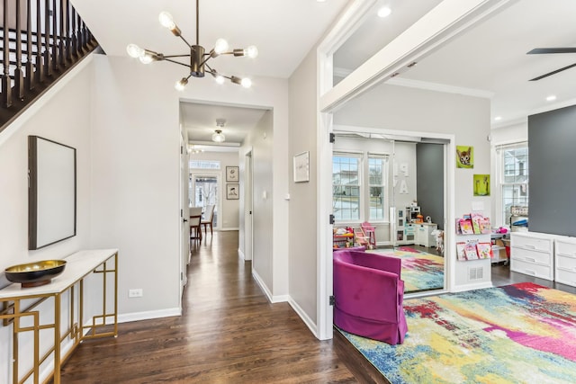 corridor with recessed lighting, baseboards, stairway, dark wood-style floors, and an inviting chandelier