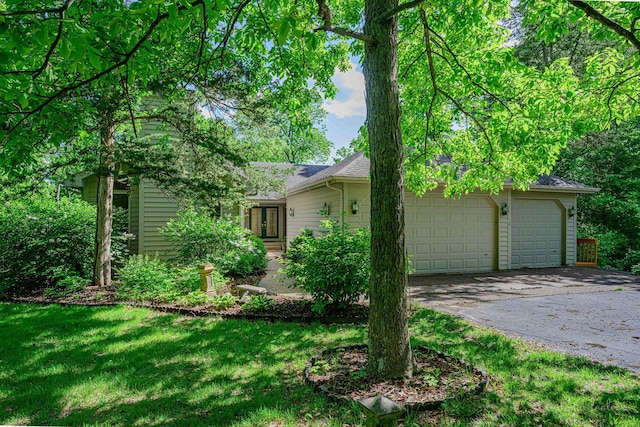 18 Colony Ln, Galena, IL 61036 - view of front of home with driveway, a front yard, roof with shingles, and french doors