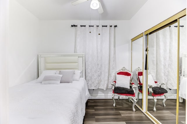 bedroom with wood finished floors and a ceiling fan