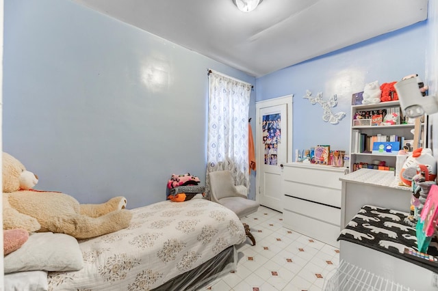 bedroom with light floors