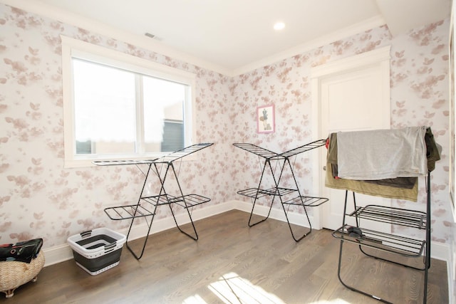 misc room with wallpapered walls, baseboards, and wood finished floors