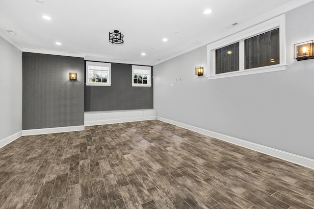 unfurnished room featuring recessed lighting, baseboards, and wood finished floors