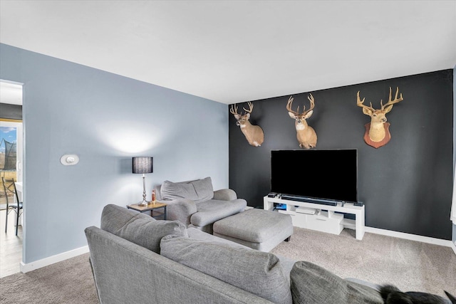 1695 Willowdale Dr, Saint Joseph, IL 61873 - carpeted living room with an accent wall and baseboards
