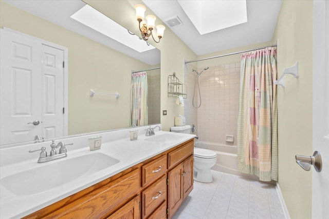 bathroom with a skylight, tile patterned flooring, a sink, and shower / bath combo