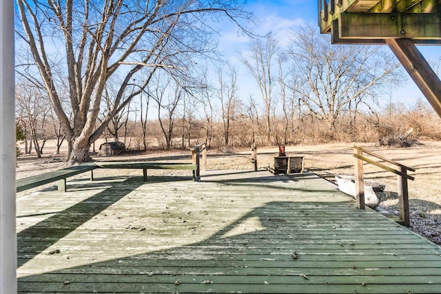 exterior space featuring a deck and central AC