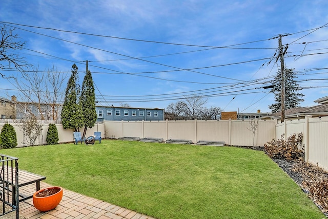 view of yard featuring a fenced backyard