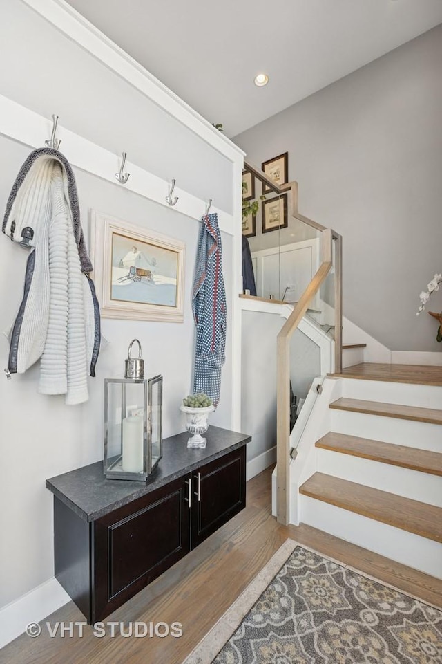 mudroom featuring recessed lighting, baseboards, and wood finished floors