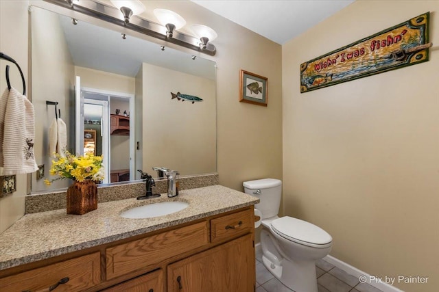 631 Alice Ct, Elgin, IL 60123 - half bathroom with tile patterned floors, toilet, and vanity