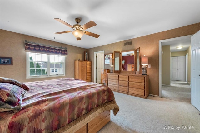 631 Alice Ct, Elgin, IL 60123 - carpeted bedroom featuring baseboards and a ceiling fan