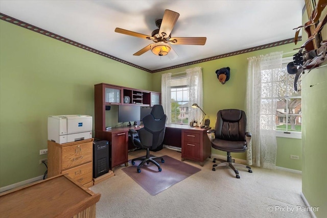631 Alice Ct, Elgin, IL 60123 - office area featuring light colored carpet, ornamental molding, baseboards, and ceiling fan