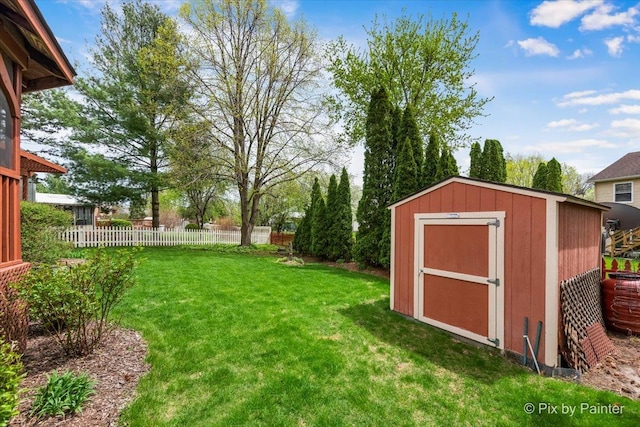 631 Alice Ct, Elgin, IL 60123 - view of yard with a shed and an outbuilding