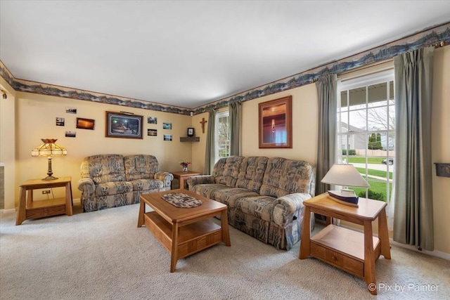 631 Alice Ct, Elgin, IL 60123 - living room with light carpet and baseboards