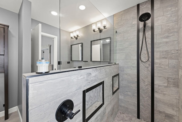 bathroom featuring baseboards and walk in shower