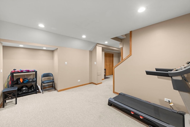 workout room featuring recessed lighting, baseboards, and light carpet