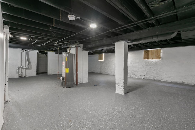 unfinished basement with water heater