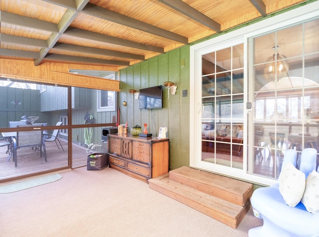 sunroom / solarium with beamed ceiling