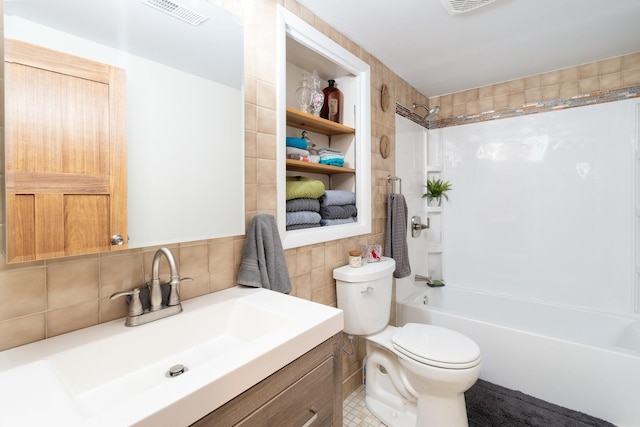 full bathroom featuring tile walls, visible vents, shower / bathing tub combination, toilet, and vanity