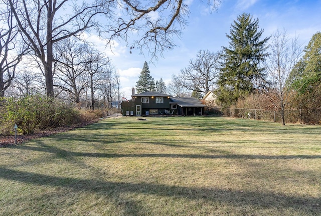 view of yard featuring fence