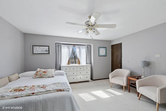 bedroom with light carpet and ceiling fan