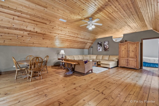 living room with a ceiling fan, vaulted ceiling, wood ceiling, and light wood-style floors