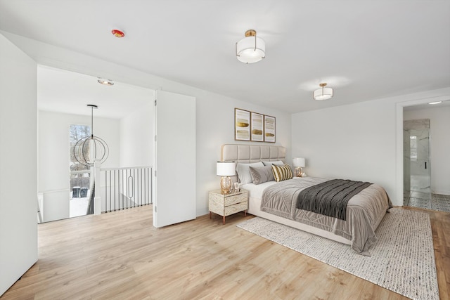 bedroom featuring light wood finished floors