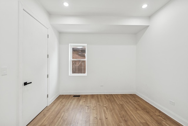 unfurnished bedroom with baseboards, recessed lighting, visible vents, and light wood-style floors