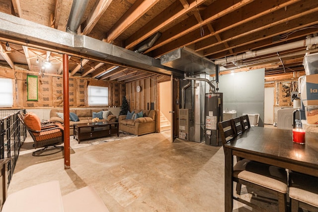 basement with water heater and heating unit