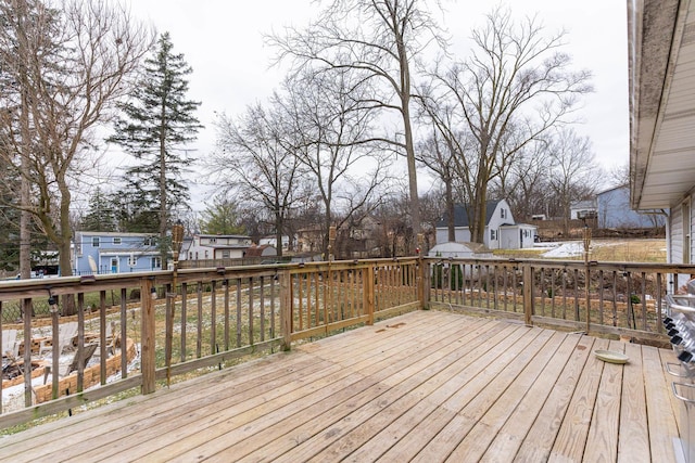 wooden deck with a residential view