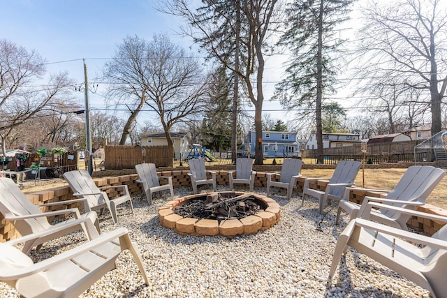 view of patio with a fire pit and a fenced backyard