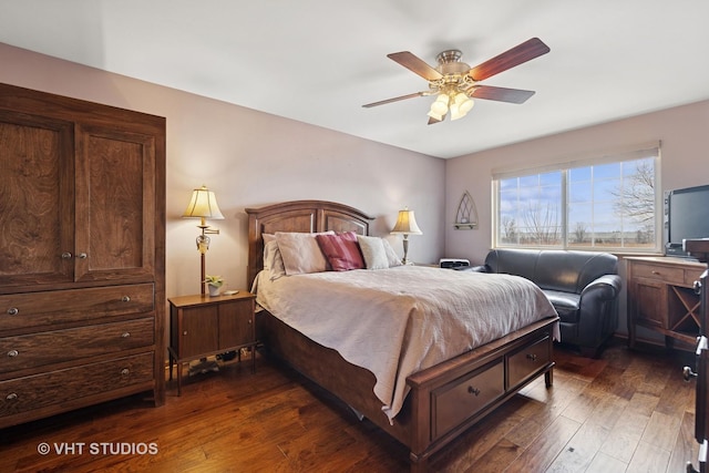 bedroom with dark wood-style floors and ceiling fan