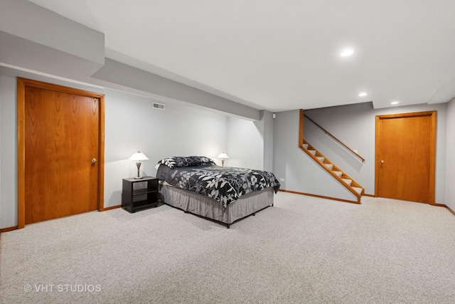 bedroom featuring recessed lighting, carpet flooring, visible vents, and baseboards