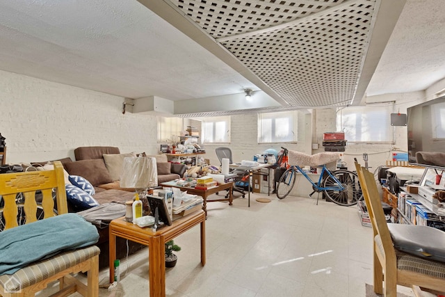 living room with tile patterned floors