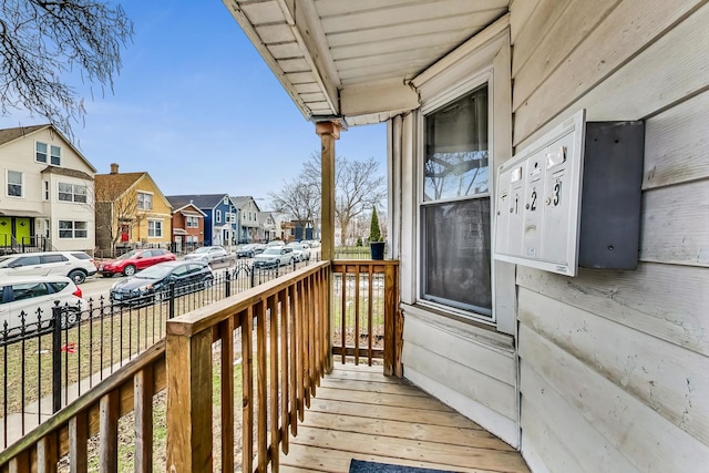 balcony with a porch and a residential view