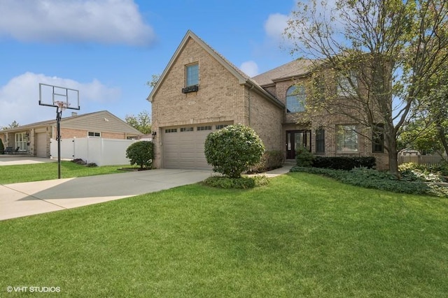 traditional-style home with an attached garage, brick siding, fence, driveway, and a front lawn