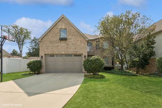 traditional-style house with brick siding, an attached garage, a front yard, fence, and driveway