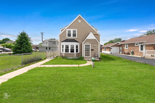 3706 Ruby St, Schiller Park, IL 60176 - back of house with asphalt driveway and a detached garage